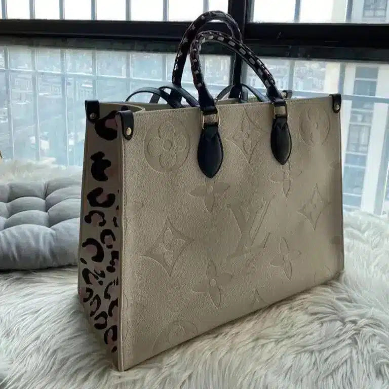 Vuitton On The Go Side Leopard White Tote Bag