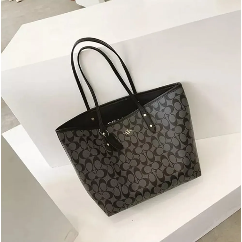 Classy Women’s Coach Signature Tote Bag