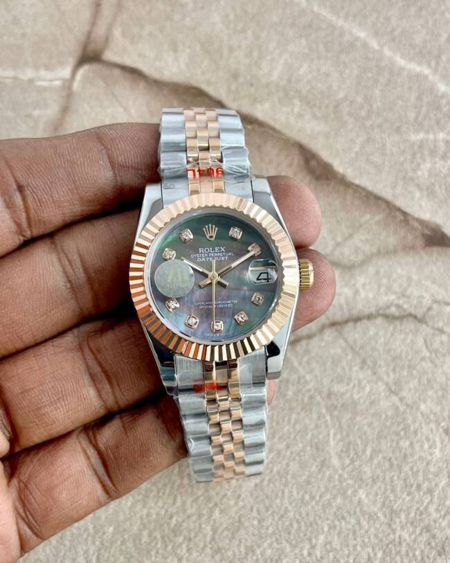Rolex Perpetual DateJust Silver Gold Watch