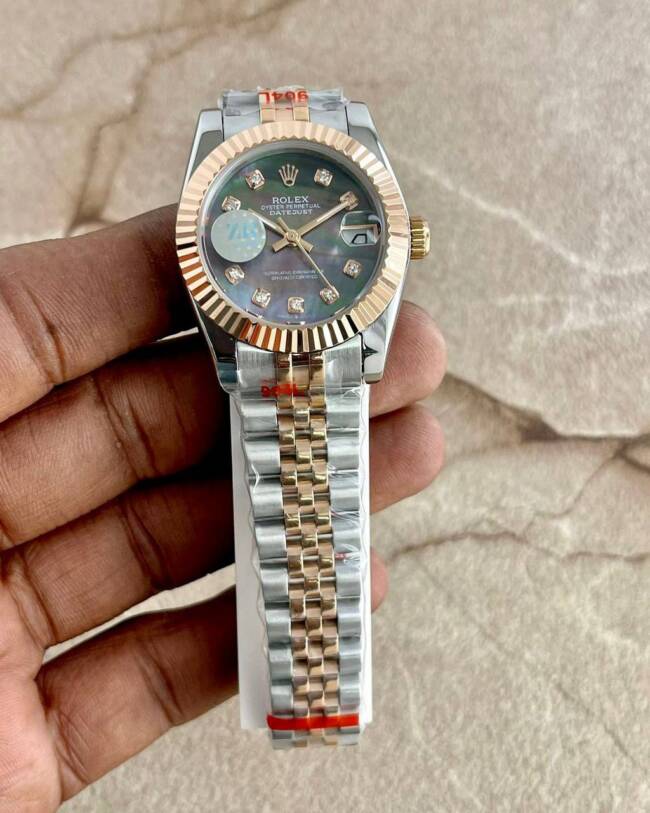 Rolex Perpetual DateJust Silver Gold Watch