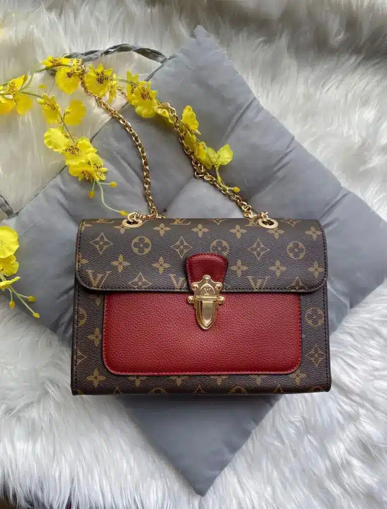 Vuitton Victorie Monogram Maroon Hand Bag