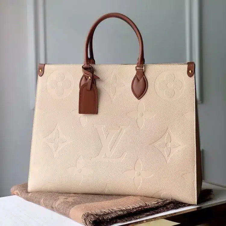 LV Beige Embossed On The Go Mm Bag